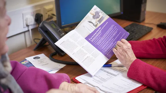looking at leaflets