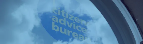 CAB logo in window with clouds with a blue filter over it